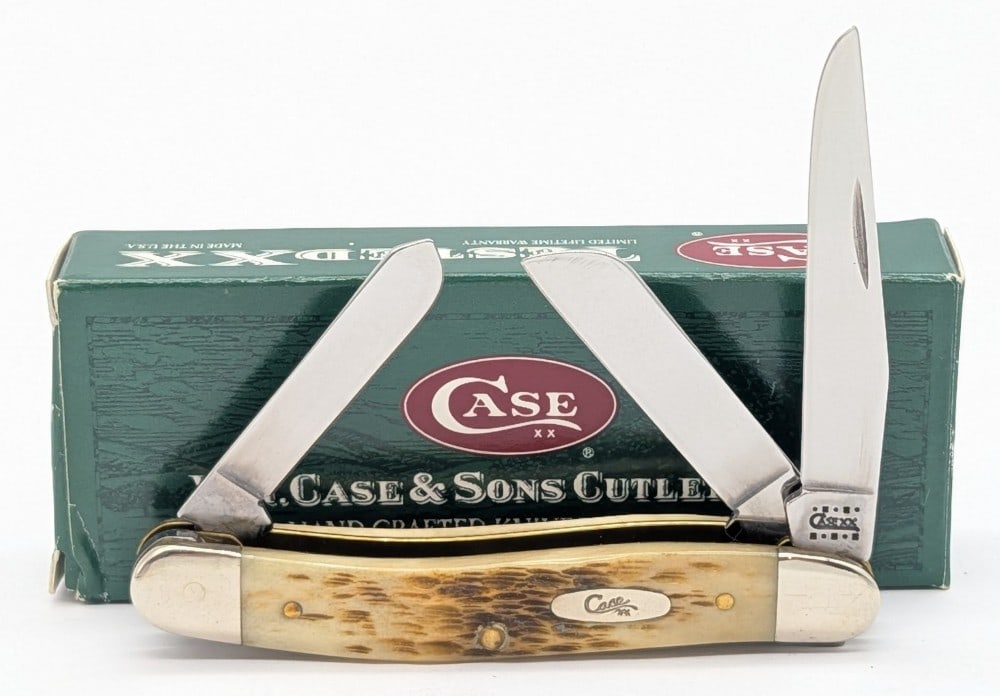 2000 Case XX Amber Bone Medium Stockman 6318 w/ Box: Knife is in very nice condition with light scuffs on the bolsters from handling. Overall measures 3-1/2in when closed.