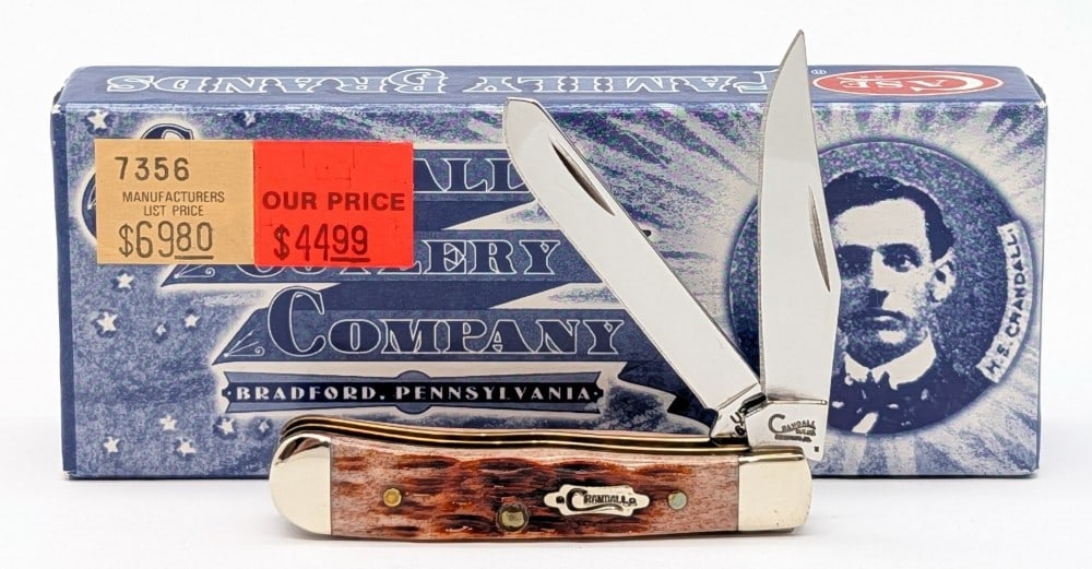 2009 Case XX Crandall Cutlery Co. Caramel Bone Tiny Trapper 62154 w/ Box: Knife is in very nice condition with light tarnishing from handling. Overall measures 2-3/8in when closed.
