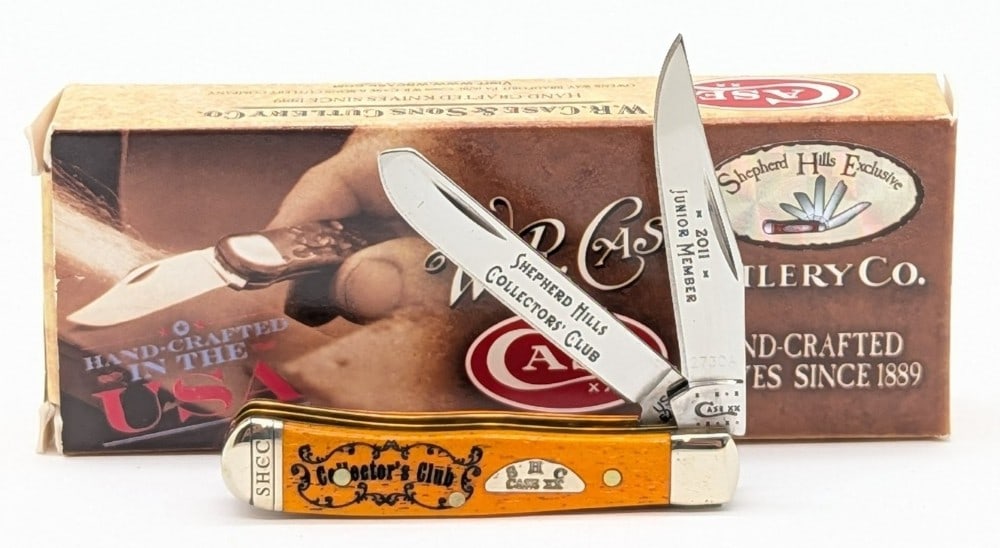 2011 Case XX SHCC Junior Member Persimmon Orange Tiny Trapper 62154 w/ Box: Knife is numbered 2730A, and is in very nice condition with light tarnishing from handling. Overall measures 2-3/8in when closed.