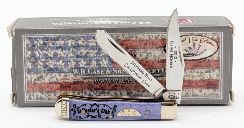 2012 Case XX SHCC Junior Member Ultra Violet Bone Tiny Trapper 62154 w/ Box: Knife is numbered 2730A, and is in very nice condition with light tarnishing from handling. Overall measures 2-3/8in when closed.