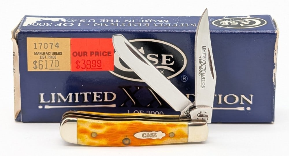 Ltd 2005 Case XX Orange Peel Bone Tiny Trapper 62154 w/ Box: Knife is 1 of 3000, and is in very nice condition with minimal wear from handling. Overall measures 2-3/8in when closed.
