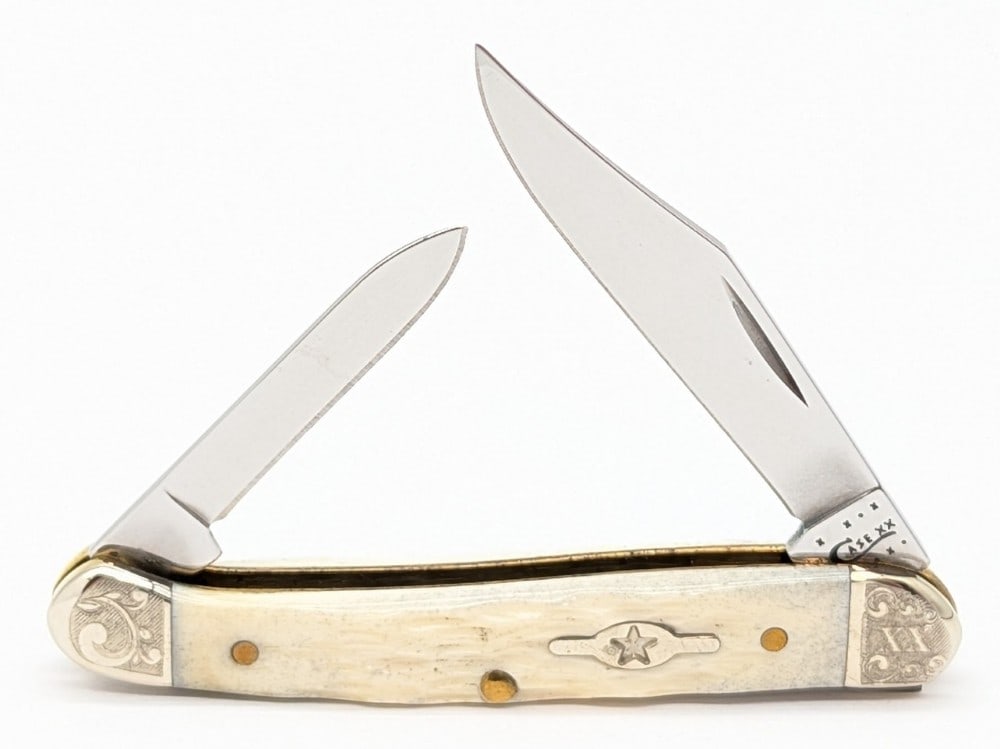Ltd 2011 Case XX Scroll Bolster Natural Bone Mini Copperhead 62109X: Knife is numbered 058, and is in very nice condition with light scuffs on the bolsters from handling. Overall measures 3-1/8in when closed.