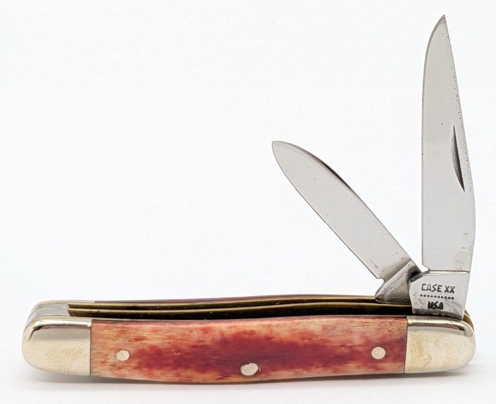 1980 Case XX Smooth Red Bone Small Jack Knife SR62027: Knife is in nice condition with light scuffs on the bolsters from handling. Overall measures 2-7/8in when closed.