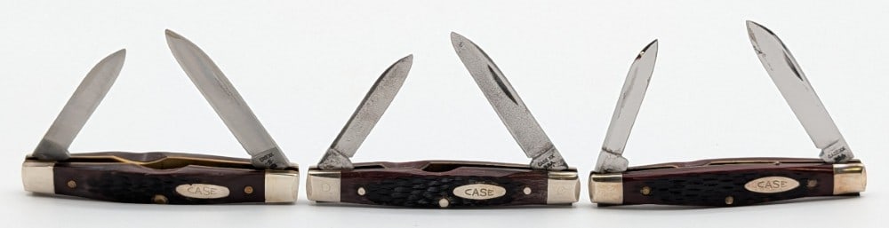 1974, 78, & 87 Case XX Jigged Delrin Texas Jack Knives 62042: Knives are in good condition with light tarnishing on the blades, and light scuffs on the bolsters from handling and age. Overall measures 2-7/8in when closed.