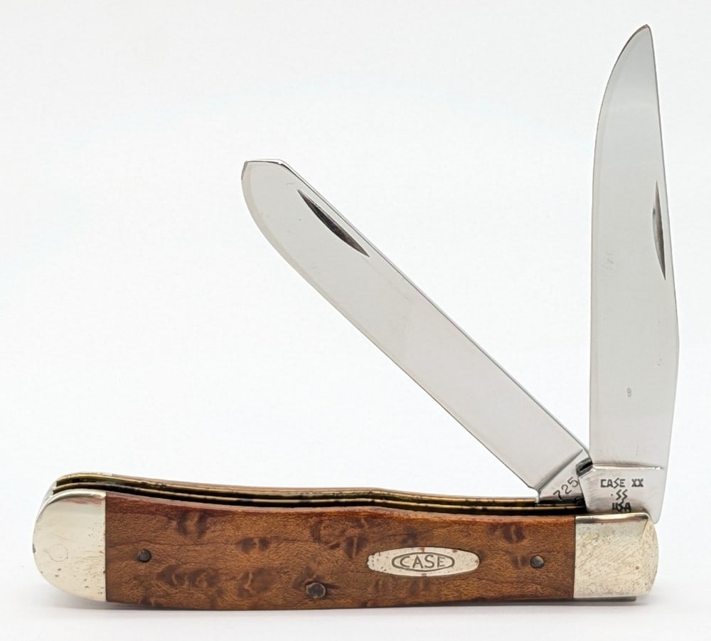 1989 Case XX Smooth Wood Trapper 7254: Knife is in good condition with some scratches and tarnishing on the bolsters from handling and age. Overall measures 4-1/8in when closed.