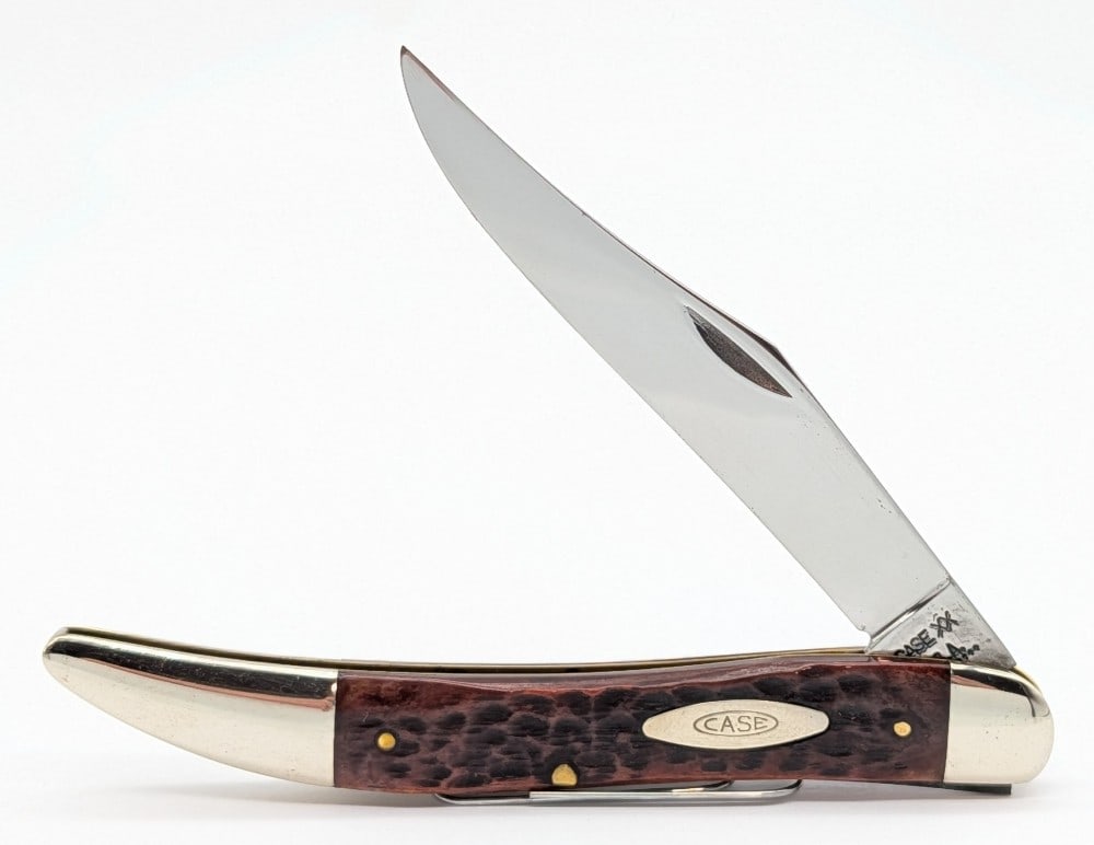 1971 Case XX Jigged Bone Large Texas Toothpick 610098: Knife is in nice condition with some light scuffs on the blade, and light scuffs and tarnishing on the bolsters from handling. Overall measures 5in when closed.