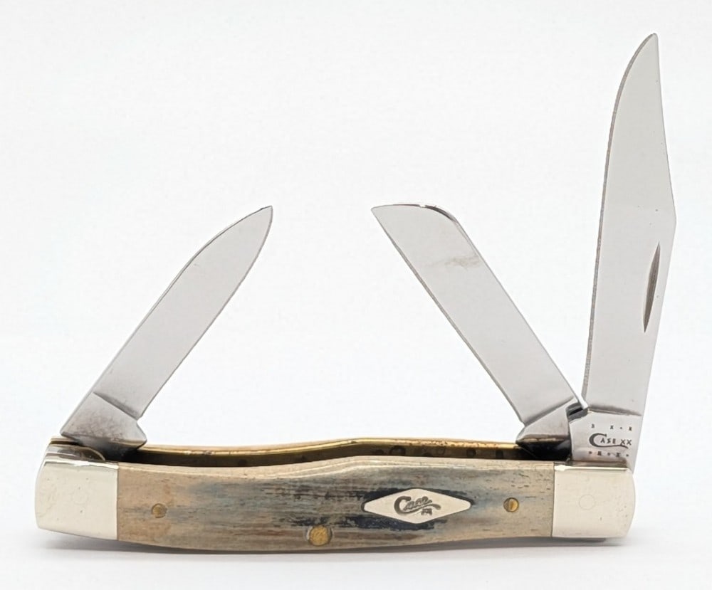 2011 Case XX Natural Bone Stockman 63032: Knife is in very nice condition with light scuffs on the bolsters from handling. Overall measures 3-1/2in when closed.