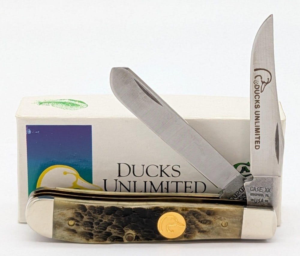 1990 Case XX Ducks Unlimited Amber Bone Mini Trapper 6207 w/ Box: Knife is in like new condition. Overall measures 3-1/2in when closed.