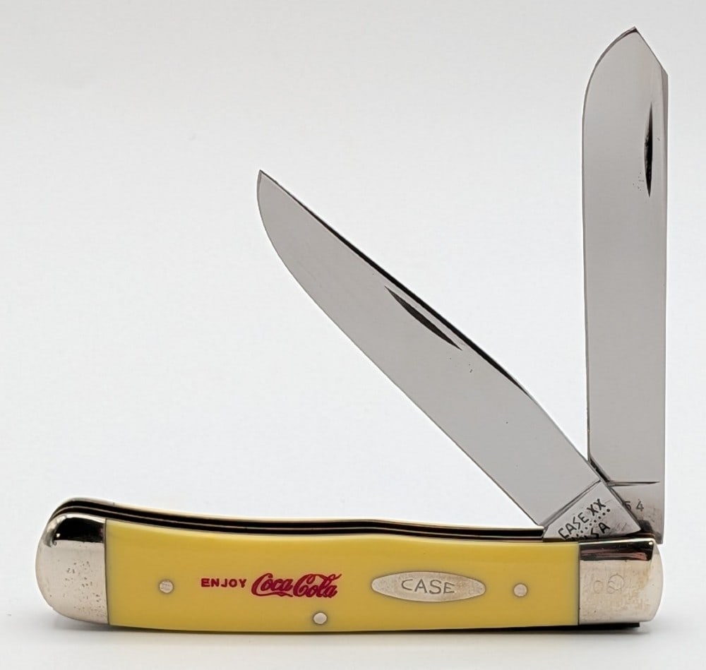 Ltd 1980 Case XX Coca-Cola Advertising Yellow Synth Trapper 3254: Knife is numbered 061, and is in nice condition with light scuffs and tarnishing on the bolsters from handling. Overall measures 4-1/8in when closed.