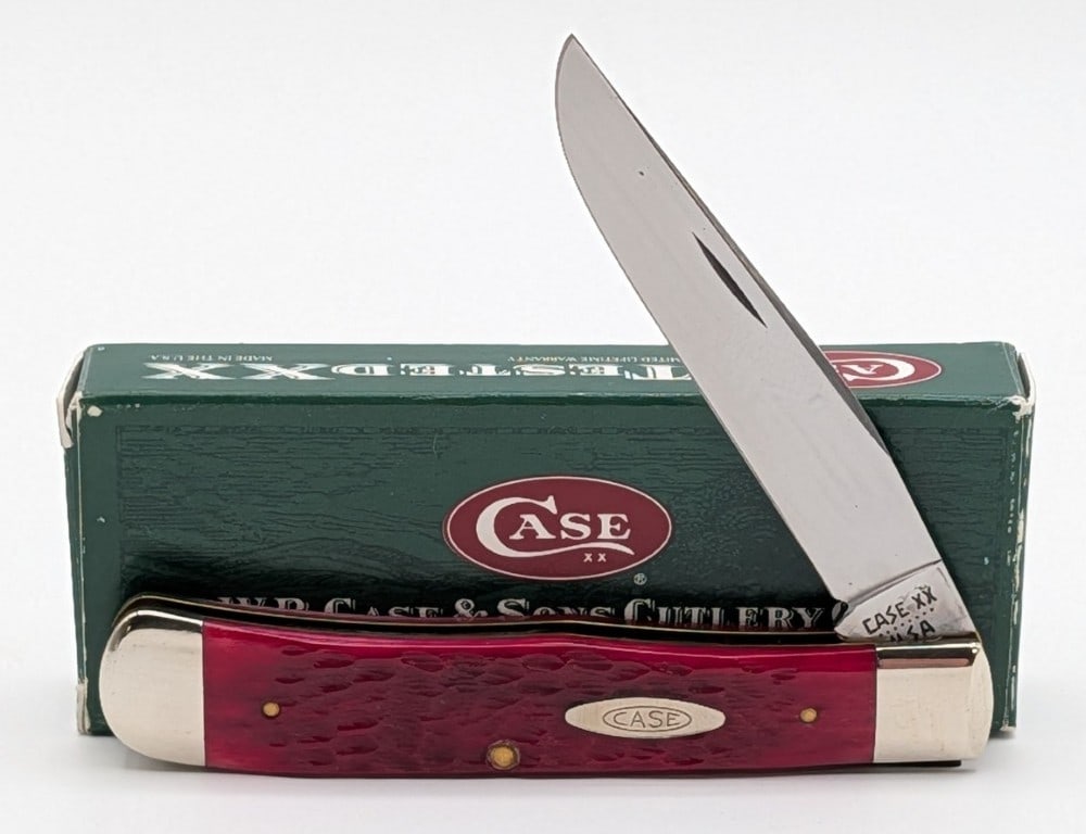 1982 Case XX Red Bone 1 Blade Trapper 6154: Comes in a non matching box. Knife is in like new condition. Overall measures 4-1/8in when closed.