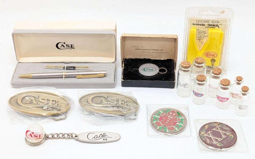 Case XX Merchandise - Belt Buckles, Pen, Bottles, & More: Includes belt buckles, key chains, knife sharpener, pen, bottles, and marble. Pieces are all in very nice condition.