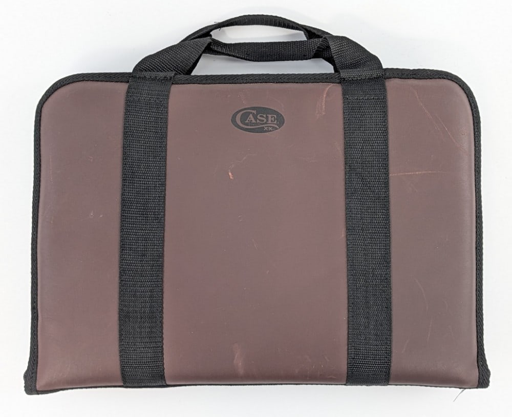 Case XX 42 Slot Padded Knife Carrying Case: Case is in nice condition with general scuffs and wear from use and handling. Measures 16in wide x 11in tall.