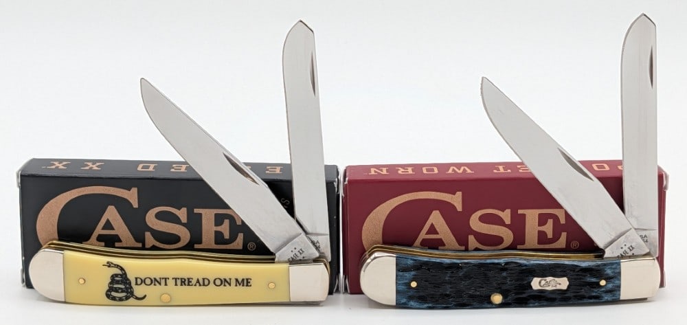 2026 Case XX Mediterranean Blue Bone & Synth Yellow Trappers w/ Boxes: Knives are in like new condition. Overall measures 4-1/8in when closed.