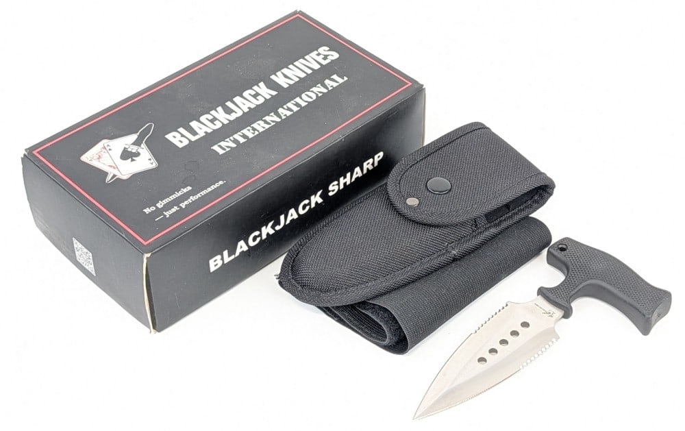 Blackjack Knives Push Dagger w/ Sheath & Box: Features a double edged partially serrated blade, and a checkered rubber handle. Knife is in very nice condition with light scuffs on the blade from handling. Blade length measures 4-3/8in and overall
