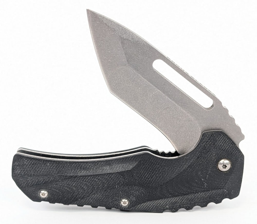 Brous Blades Reloader Tanto Flipper Folding Knife: Features a stonewash finish tanto blade with thumb notches, and black micarta handle scales. Knife is in very nice condition with light scuffs from handling. Overall measures 4-5/8in when closed.