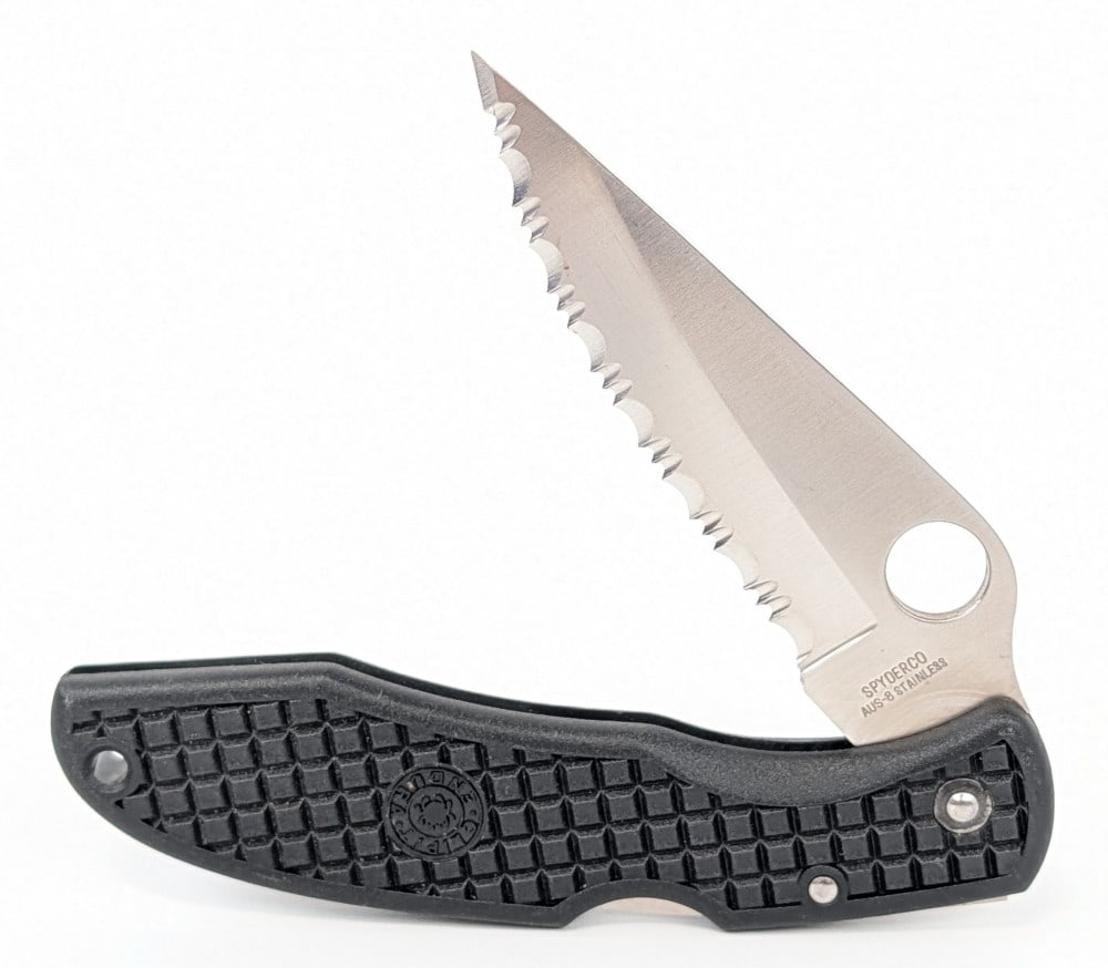 Spyderco Endura Serrated Folding Knife: Knife is in like new condition. Overall measures 4-3/4in when closed.