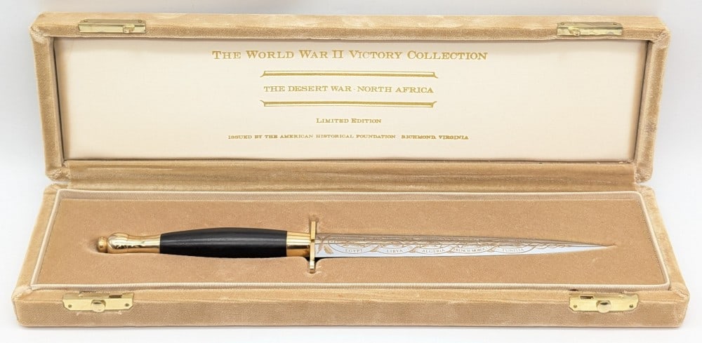 Ltd American Historical Society WWII African Front Commemorative Sikes Dagger w/ Case: Knife is numbered 364 of 2500 and comes in the display case with the COA. Features a mirror polished blade with different names in the Africa Campaign, a brass guard and pommel, and a smooth wood hand