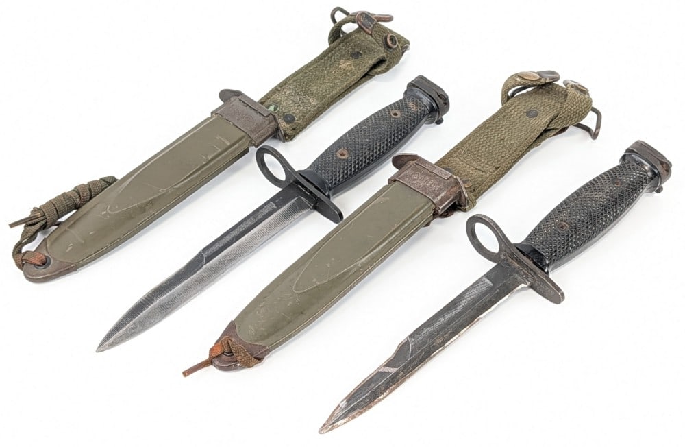 Vietnam Era U.S. Conetta & Bauer M7 Bayonets w/ Scabbard: Knives are in well used condition with scratches and material loss on the blades, and other scratches and wear from use and age. Blade length measures 6-1/2in and overall 11-5/8in.