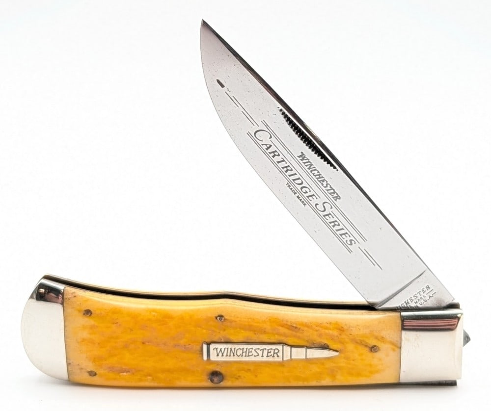 1993 Prototype Winchester Cartridge Series Yellow Bone Trapper 29103: Knife is in very nice condition with light scuffs from handling. Overall measures 4-1/2in when closed.