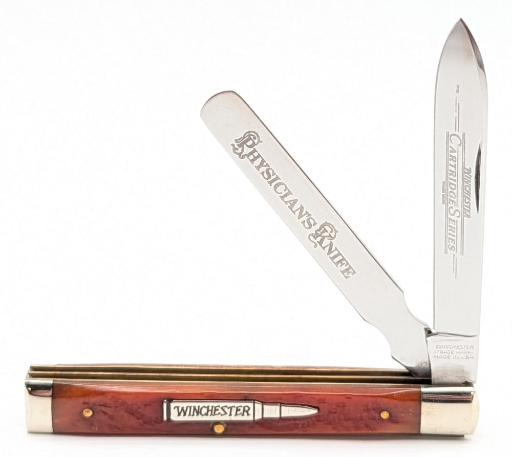 2003 Winchester Cartridge Series Orange Bone Physcian's Knife 29123: Knife is in very nice condition with minimal wear from handling. Overall measures 3-5/8in when closed.