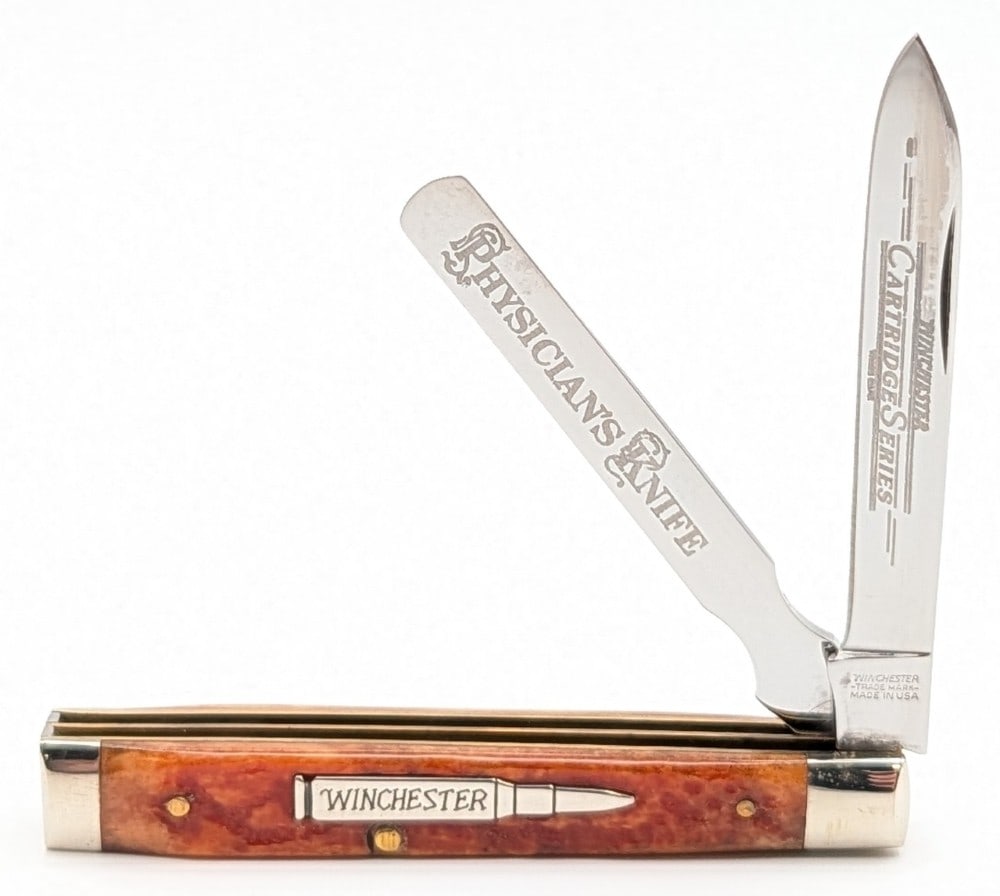2003 Winchester Cartridge Banana Bone Mini Physician's Knife 29124: Knife is in very nice condition with minimal wear from handling. Overall measures 3-1/8in when closed.