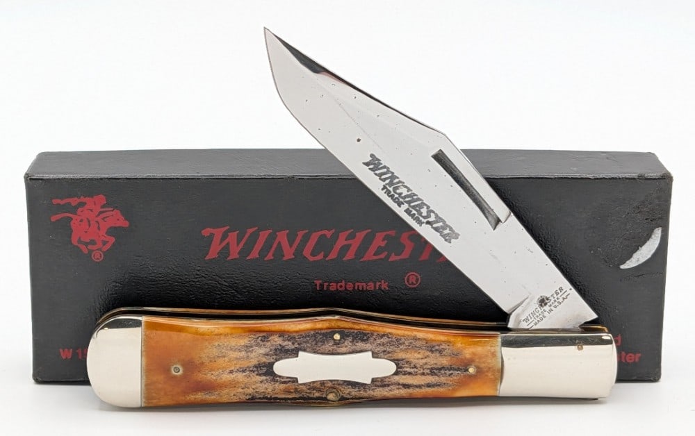 1991 Winchester Stag Coke Bottle 1920S w/ Box: Knife is in nice condition with some carbon spots on the blade, and light scuffs on the bolsters from handling and age. Overall measures 5-1/4in when closed.