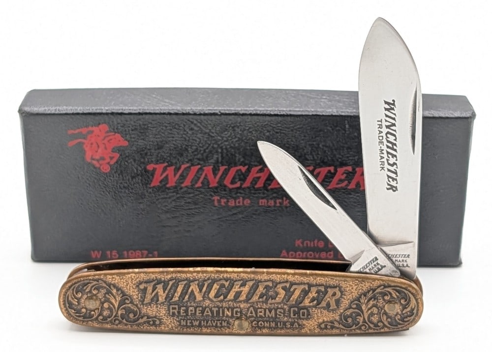 Ltd 1987 Winchester Repeating Arms Model 1873 Metal Folding Knife w/ Box: Knife is 1 of 1000, and is in very nice condition with minimal wear from handling. Overall measures 3-1/2in when closed.