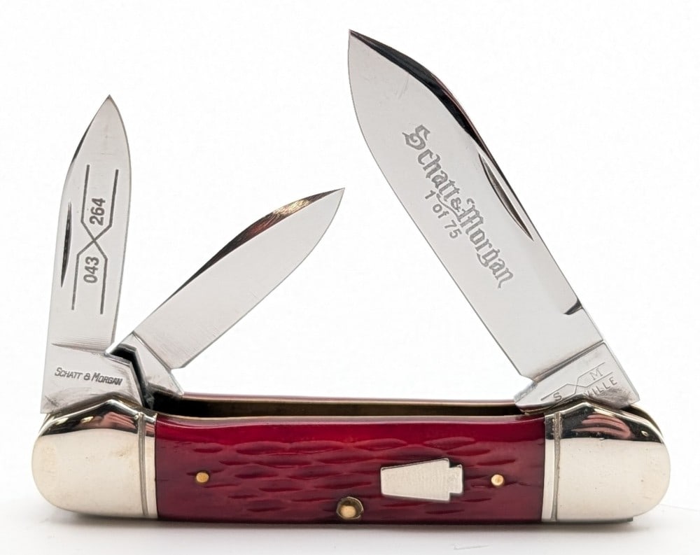 Ltd Schatt & Morgan Red Bone Canoe Knife 043 264: Knife is 1 of 75, and is in very nice condition with light scuffs on the bolsters from handling. Overall measures 3-3/4in when closed.