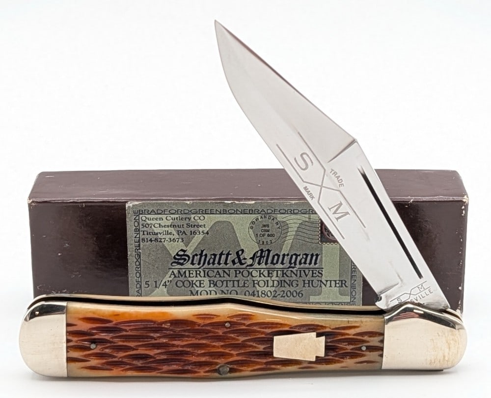1991 Schatt & Morgan Queen Cutlery Jigged Bone Copperhead Coke Bottle 041 983 w/ Box: Knife is in like new condition. Overall measures 5-1/4in when closed.