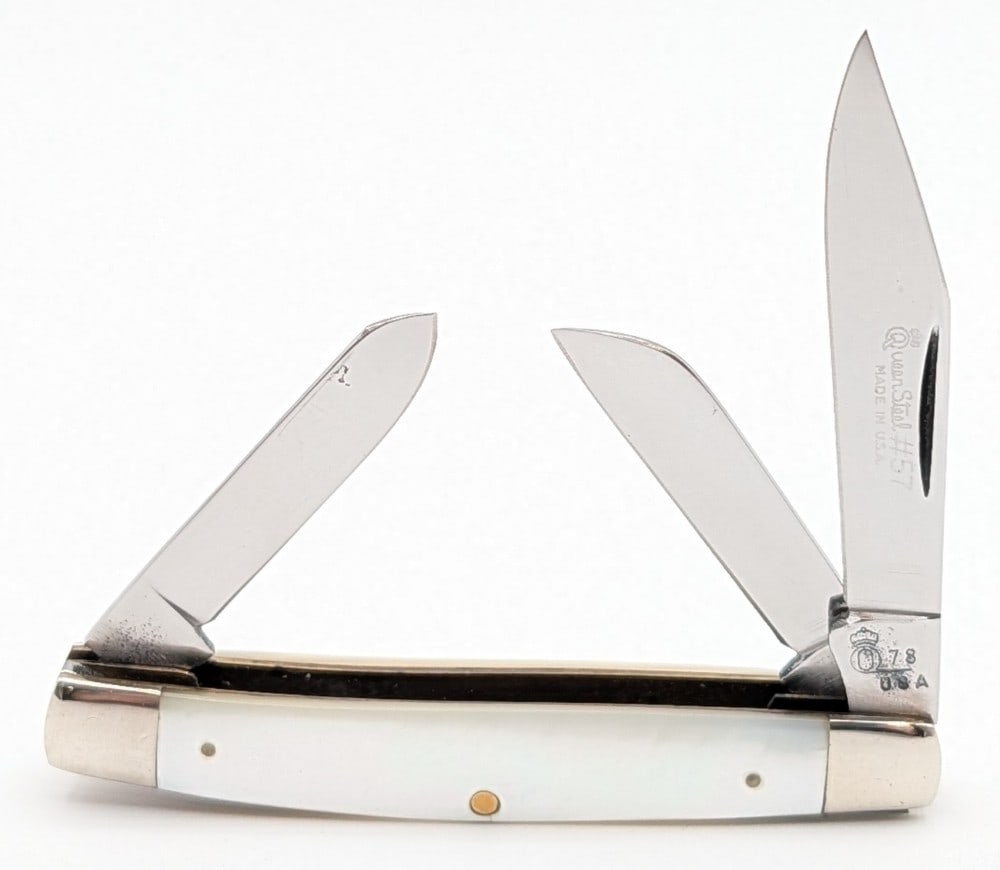 1978 Queen Cutlery Co. Mother of Pearl Stockman #57: Knife is in very nice condition with light scuffs on the bolsters from handling. Overall measures 3-3/8in when closed.