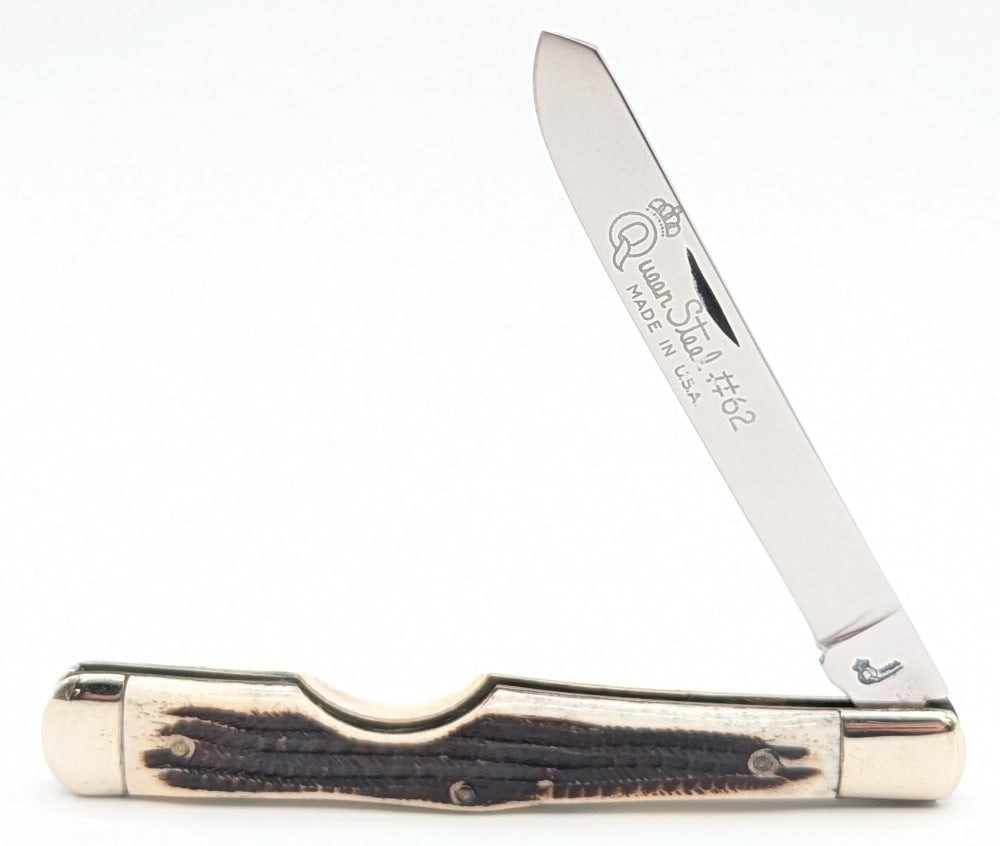 Queen Cutlery Co. Barnboard Jig Bone Large Easy Open Knife #62: Knife is in very nice condition with light scuffs on the bolsters from handling. Overall measures 5-3/8in when closed.