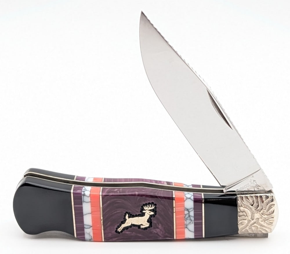Queen Cutlery Brian Yellowhorse Natural Stone Jumbo Trapper: Knife is numbered 32 of 50. Knife is in like new condition. Overall measures 4-5/8in when closed.