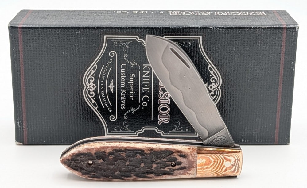 NIB 2019 Excelsior Knives Chuck Hawes Stag Spit Fire Jack Knife: A gorgeous looking premium knife with artisan craftsmanship. Features a W-2 steel blade with a hamon temper and file work on the spine, a brass copper and silver Mokume bolster, file work on the sprin