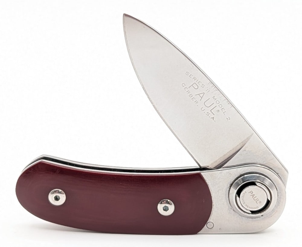 Gerber Series II Model 2 Red Micarta Paul Knife: Knife is in nice condition with light scuffs from handling. Overall measures 3-3/4in when closed.