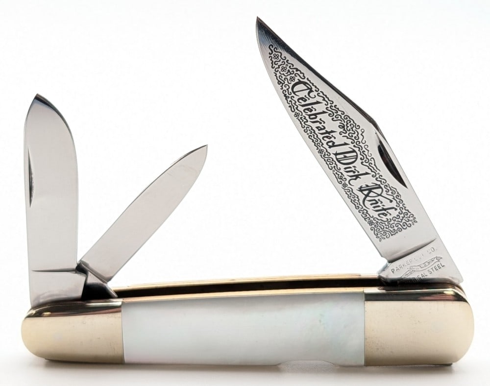 Parker Cutlery Co. Mother of Pearl Celebrated Dirk Knife: Knife is in very nice condition with general tarnishing from handling and age. Overall measures 4-1/8in when closed.
