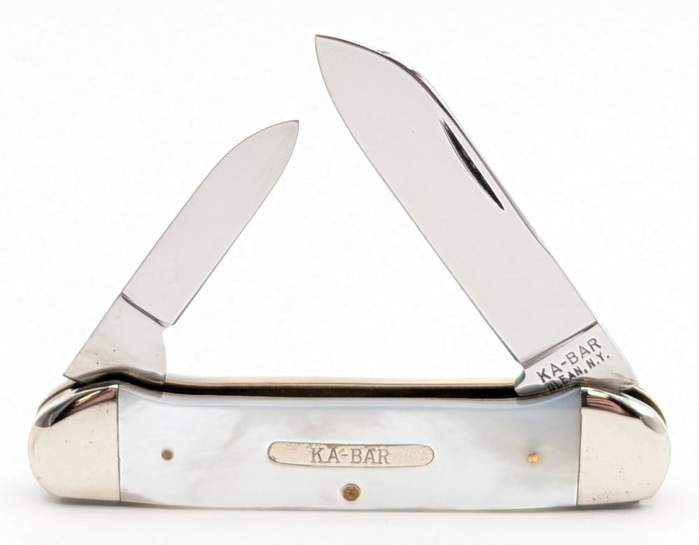 Ka-Bar Mother of Pearl Canoe Knife 1550: Knife is in very nice condition with general tarnishing from handling and age. Overall measures 3-5/8in when closed.