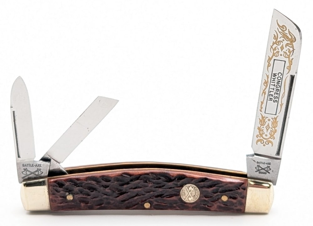 Battle Axe Brand Jigged Bone Congress Whittler: Knife is numbered 229, and is in very nice condition with light tarnishing on the bolsters from handling. Overall measures 4in when closed.