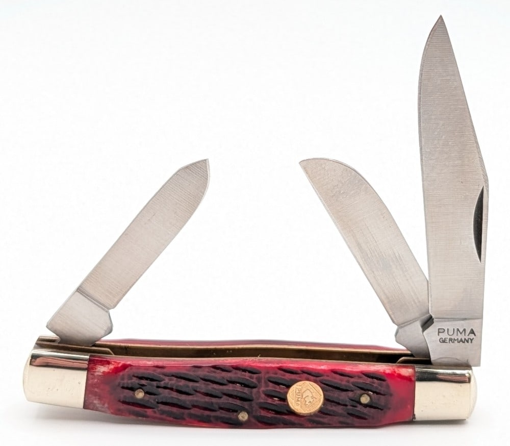 Puma Red Bone Stockman: Knife is in very nice condition with light scuffs on the bolsters from handling. Overall measures 3-7/8in when closed.