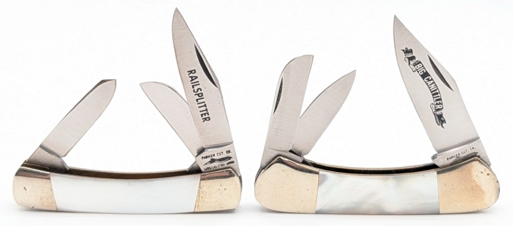 Parker Cutlery Co. Mother of Pearl Big Canitler & Railsplitter Folding Knives: Knives are in fair condition with some rusting, scratches, and tarnishing on the bolsters. Overall measures 3-1/2in when closed.