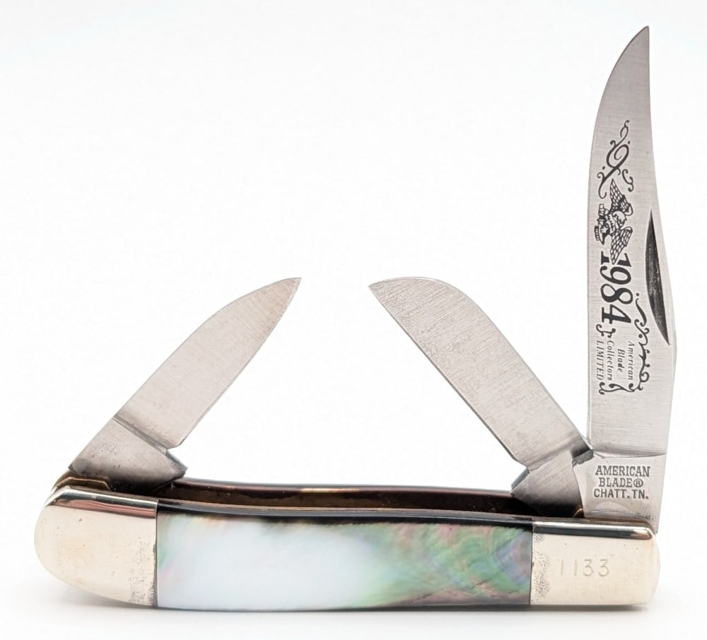 Ltd 1984 American Blade Collectors Abalone Stockman: Knife is numbered 1133, and is in nice condition with light scuffs and tarnishing on the bolsters from age. Overall measures 3-1/2in when closed.