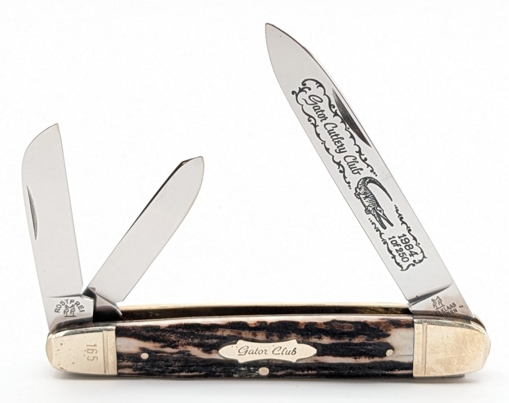 Ltd 1984 Robi Klass Kissing Crane Gator Cutlery Club Stag Cigar Whittler: Knife is numbered 165 of 250, and is in nice condition with light scuffs and tarnishing on the bolsters from handling and age. Overall measures 4-1/2in when closed.