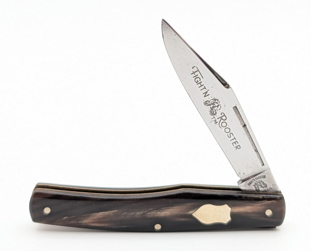 Frank Buster Fight'n Rooster Buffalo Horn Jack Knife: Knife is in nice condition with some tarnishing on the blade from age. Overall measures 3-1/2in when closed.
