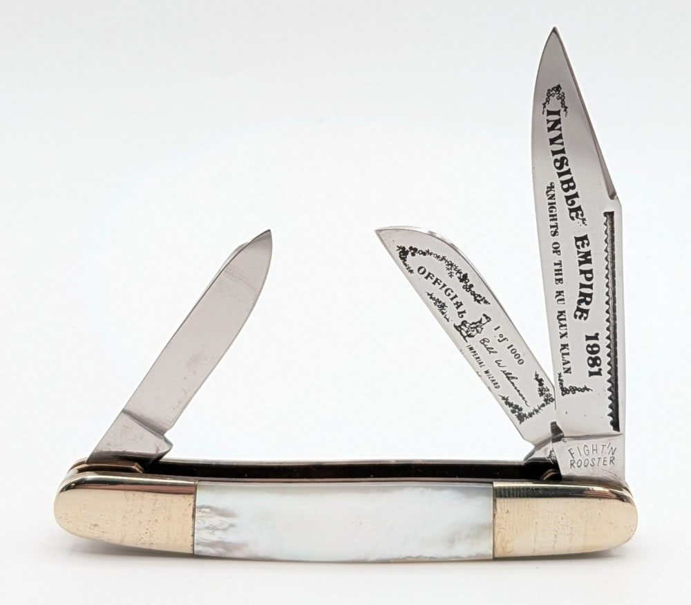 Ltd 1981 Fight'n Rooster The Invisible Empire Ku Klux Klan Mother of Pearl Stockman: Knife is 1 of 1000, and is in very nice condition with some light scuffs and tarnishing on the bolsters from handling. Overall measures 3-7/8in when closed.
