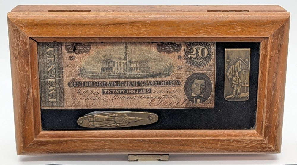 Ku Klux Klan Folding Knife, Money Clip, & Confederate Bill Display: Knife is marked Taylor Cutlery, the money clip is marked Daniel Low & Co., and the bill is a real $20 Confederate note. The knife and money clip are in nice condition with tarnishing on the brass from