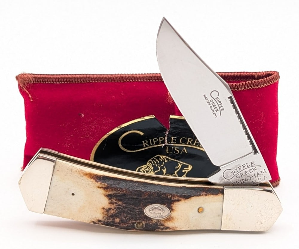Cripple Creek Cutlery Stag Jumbo Whittler w/ Case: Knife is in very nice condition with light scuffs on the bolsters from handling. Overall measures 4-3/8in when closed.