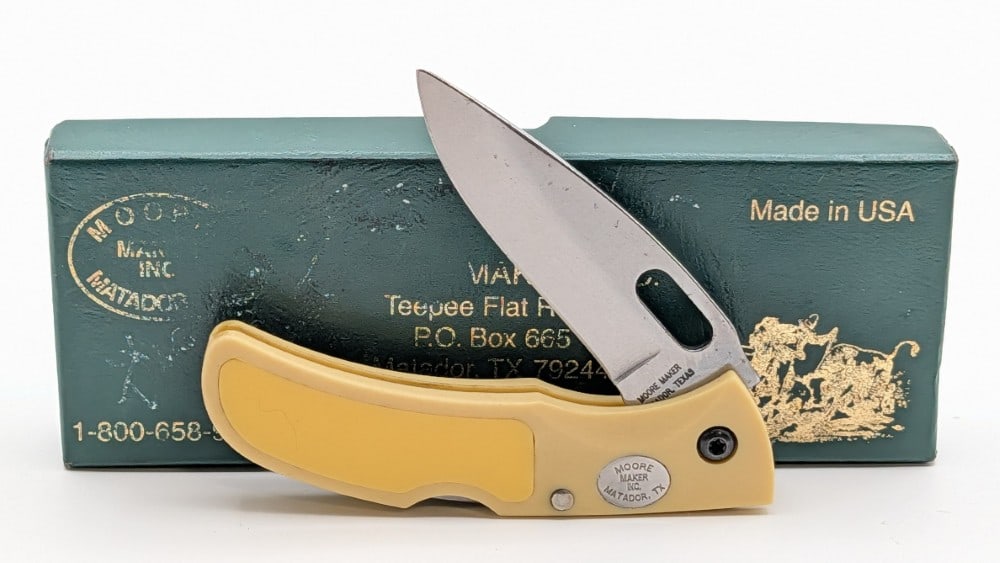 Moore Maker Synth Yellow Lockback Knife 7101LB w/ Box: Knife is in like new condition. Overall measures 3-7/8in when closed.