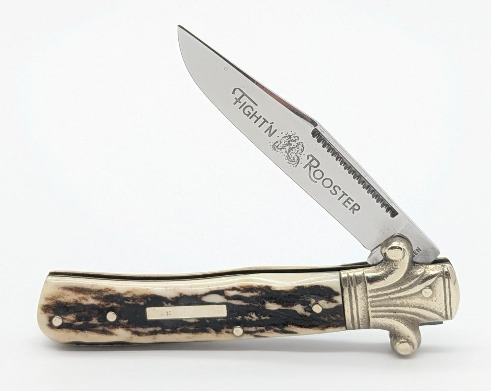 Ltd Frank Buster Fight'n Rooster Stag Scroll Guard Folding Knife: Knife is in very nice condition with light scuffs on the bolsters from handling. Overall measures 4-1/8in when closed.