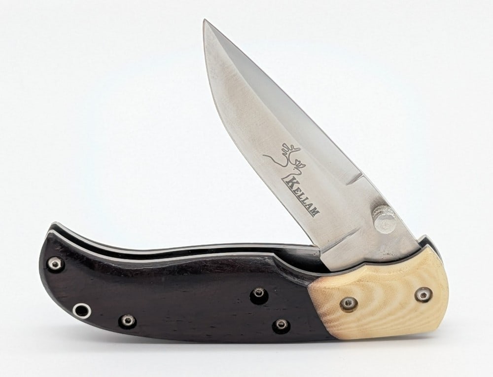 Kellam Knives Cocobolo Wood & White Micarta Linerlock Folding Knife: Knife is in very nice condition with light scuffs from handling. Overall measures 3-5/8in when closed.