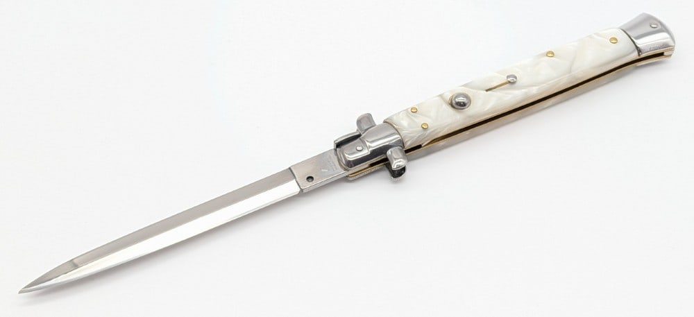 AKC 13in Faux Pearl Switchblade Knife: Knife is in like new condition. Overall measures 7-1/4in when closed.