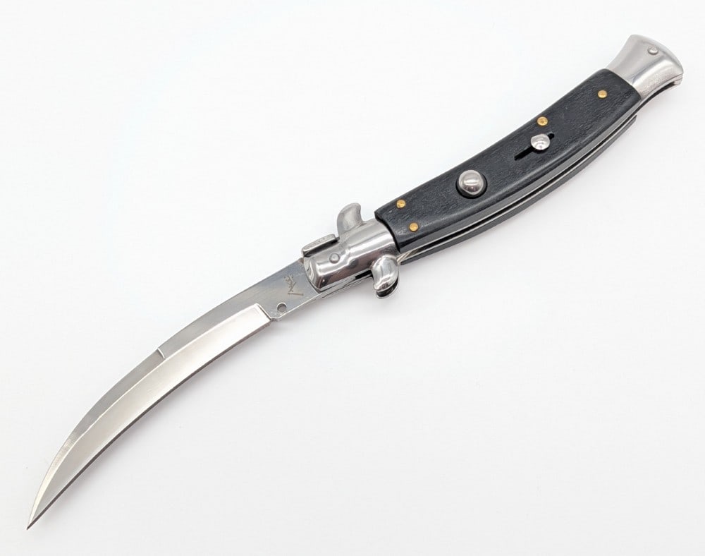 AKC 10in Black Smooth Wood Curved Switchblade Knife: Knife is in like new condition. Overall measures 5-1/2in when closed.